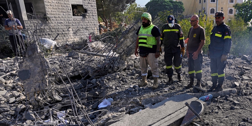 Israeli strikes on a southern Lebanese town kill at least 11 people including two children and two medics, Lebanon‘s state news agency say.