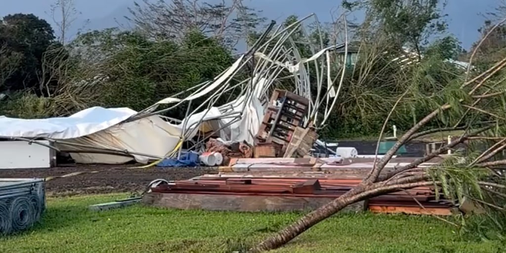 Damaging winds and heavy rains from Hurricane Lowell pelt Hawaii’s western islands, knocking out power to thousands and ripping up stretches of beachside roads.