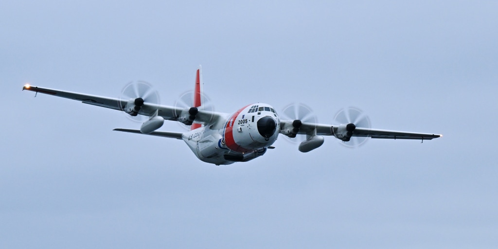 U.S. Coast Guard rescues a 15-year-old boy who survived days at sea after a fishing boat capsized off Alaska, killing his older brother and cousin.