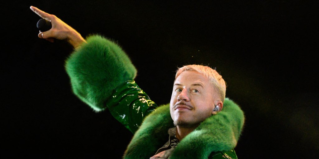 Ed Sheeran has responded after Macklemore said New England Patriots owner Robert Kraft organized a stadium boycott that forced the rapper off Sheeran’s tour.