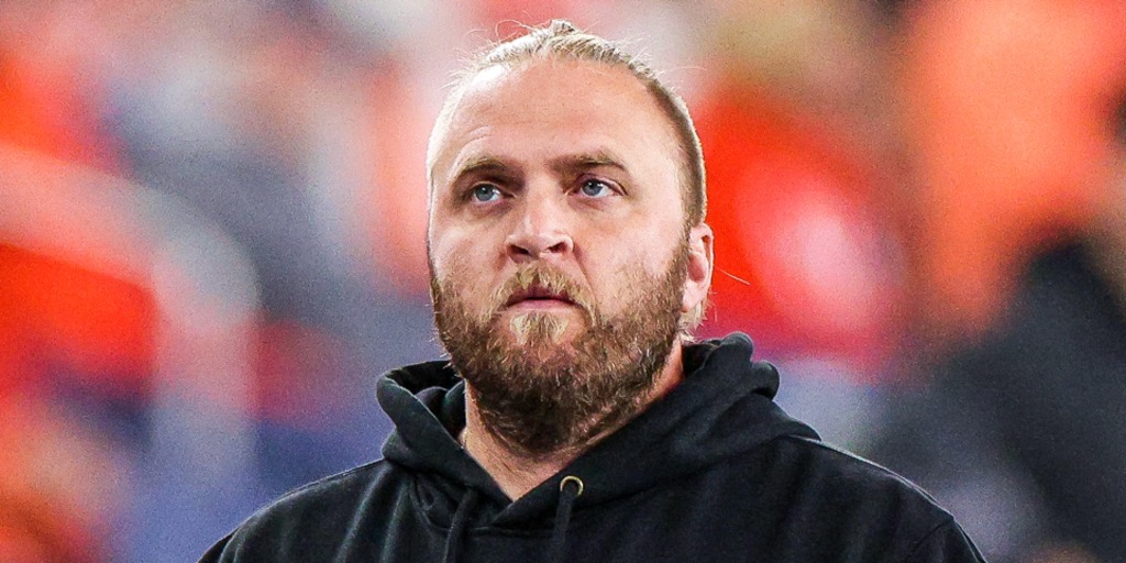 North Carolina defensive coordinator Steve Belichick, the son of head coach Bill Belichick, resigns from his position as the school concludes a probe into its football program.