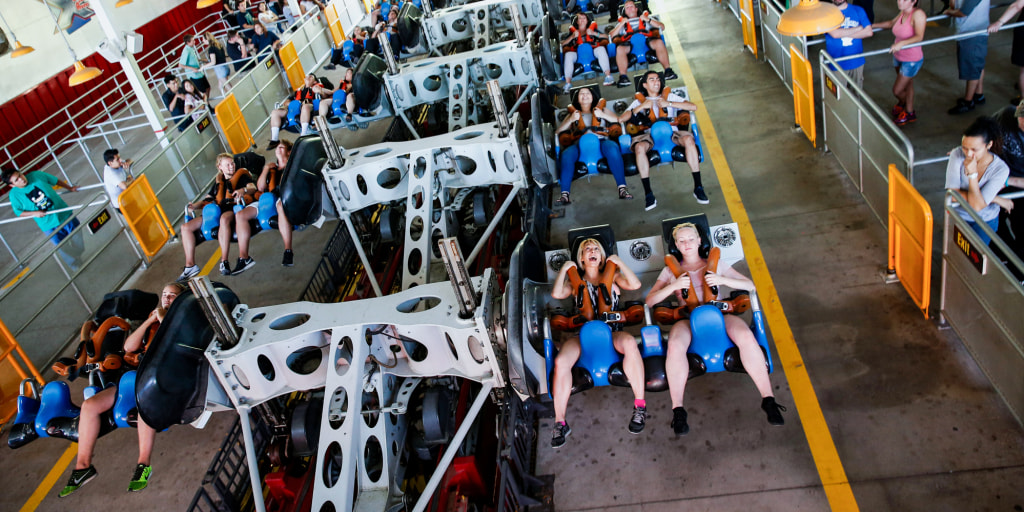 Three people who say they suffered “catastrophic” brain injuries while riding the X2 roller coaster at Six Flags Magic Mountain in Southern California have sued the amusement park and ride manufacturer for damages, court records show.