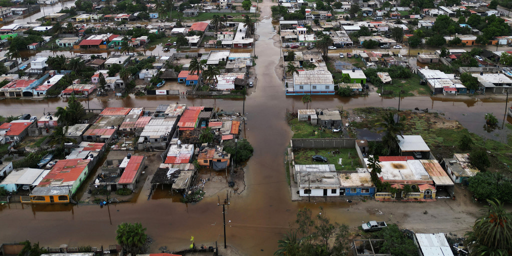 As former Hurricane Polo weakens over northwestern Mexico, the storm’s remnants are battering the U.S. Southwest, flooding roadways and forcing residents in small New Mexico towns to evacuate over concerns about a dam failing.