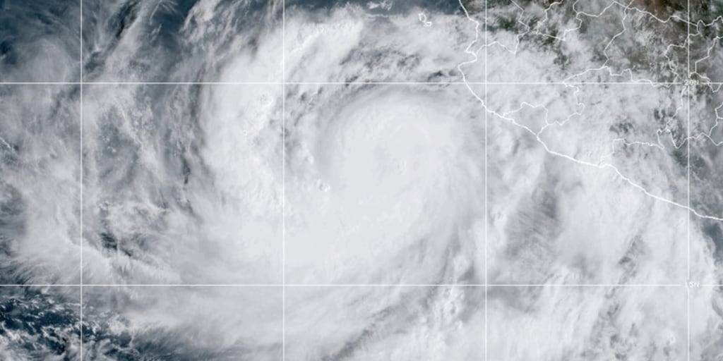 Tropical weather that surged onshore from the Pacific soaks more of the U.S. while forecasters announce yet another hurricane off the coast of Mexico.