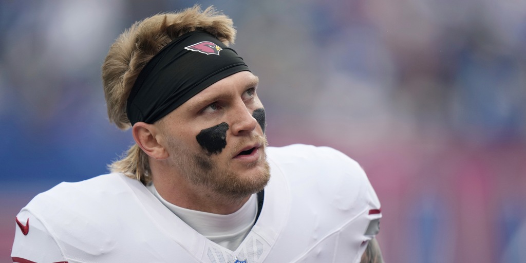 The NFL is reviewing an interaction after a sideline camera appeared to show official Jeff Seeman using profanity toward Cardinals tight end Trey McBride.