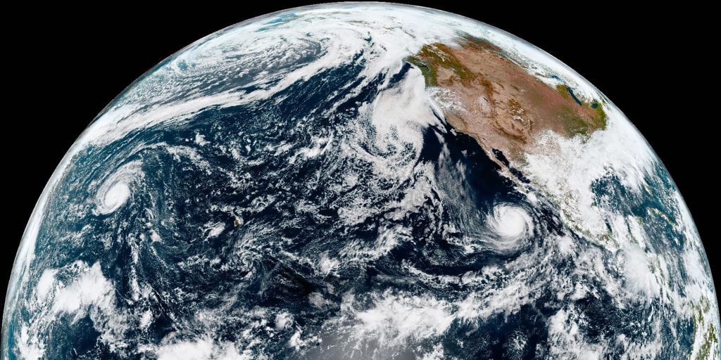 Nolo changes from a strong hurricane to a typhoon after it crosses the international date line.