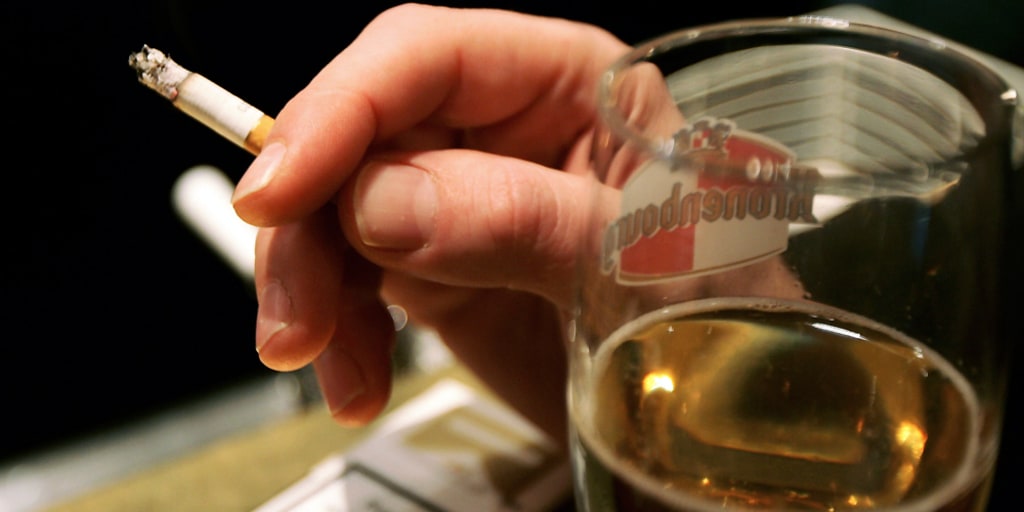 alcohol drinking and cigarette smoking Men drink less when they pay more for cigarettes, study finds