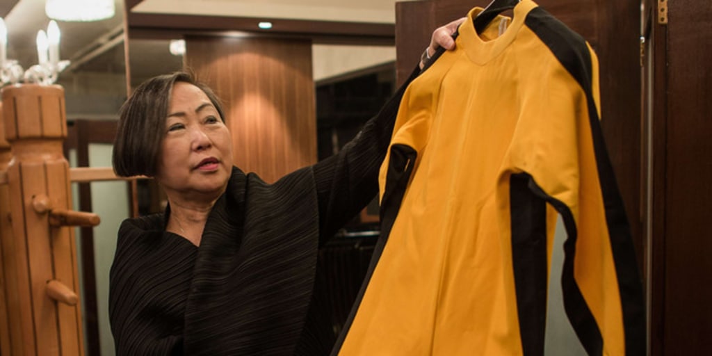 Kung fu legend Bruce Lee's famous yellow jumpsuit up for auction