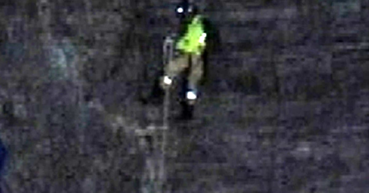 Jumper Rescue Ring Dangling base jumper rescued from cliff