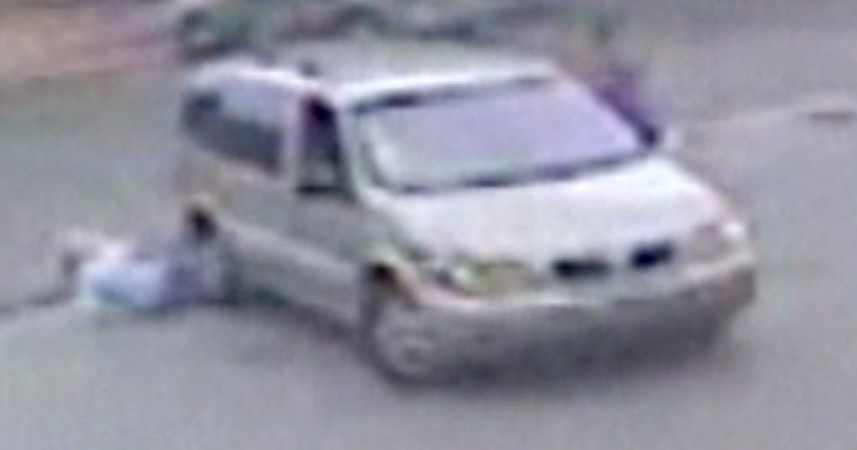 Van backs into mom and stroller, drags baby