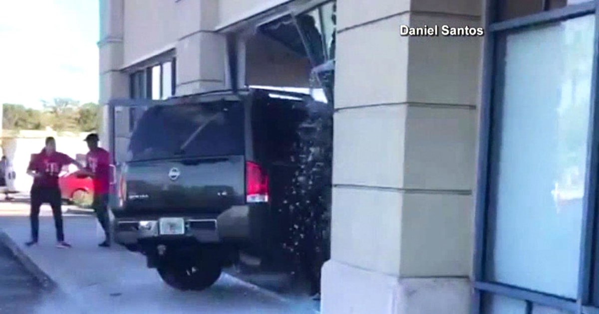 Dissatisfied T-Mobile Customer Drives SUV Through Store Window