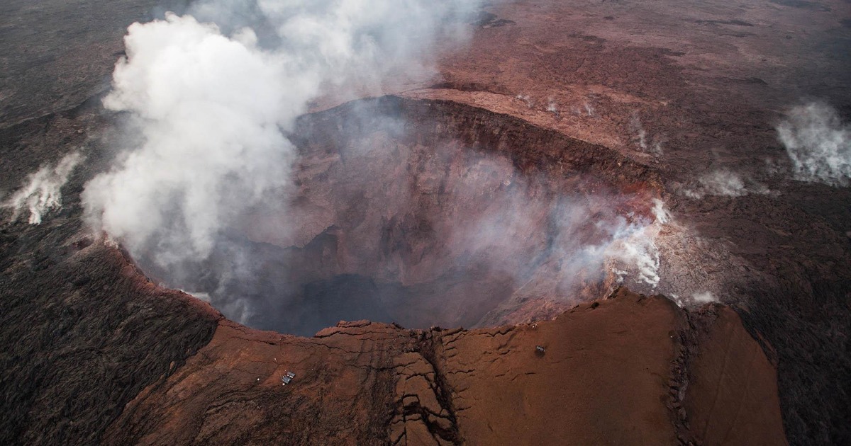 Hawaii’s Kilauea volcano spews boulders, cracks highway