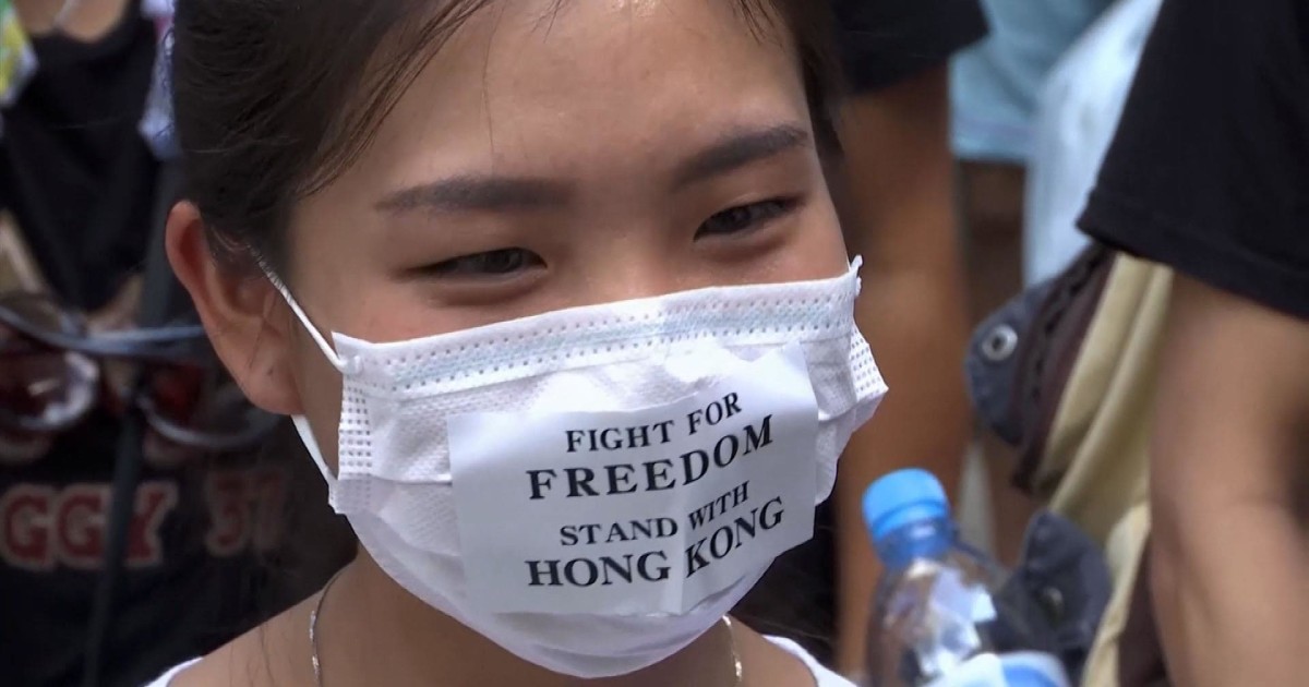 Hong Kong protesters reject new law banning face masks