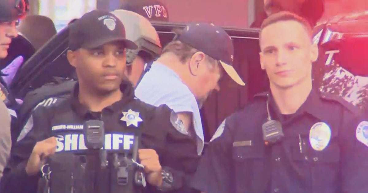 Shooting at Washington apartment building kills 1, injures 2