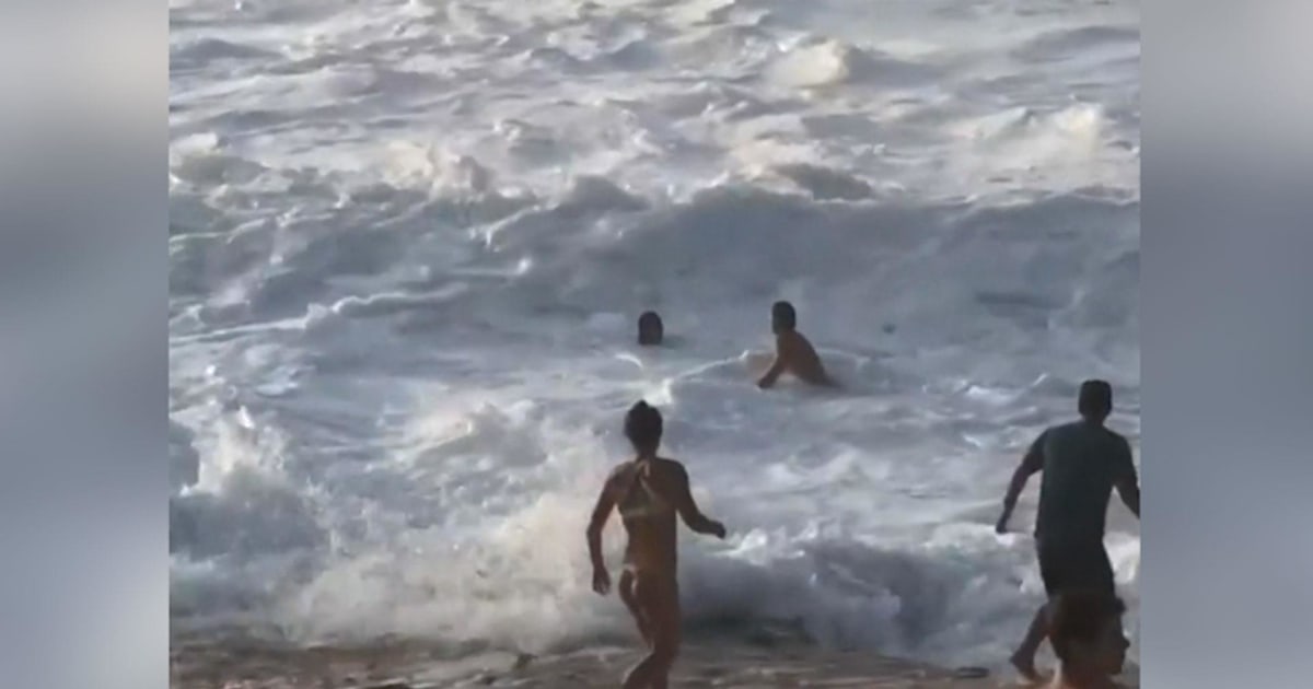 Watch Australian surfers save drowning woman in Hawaii