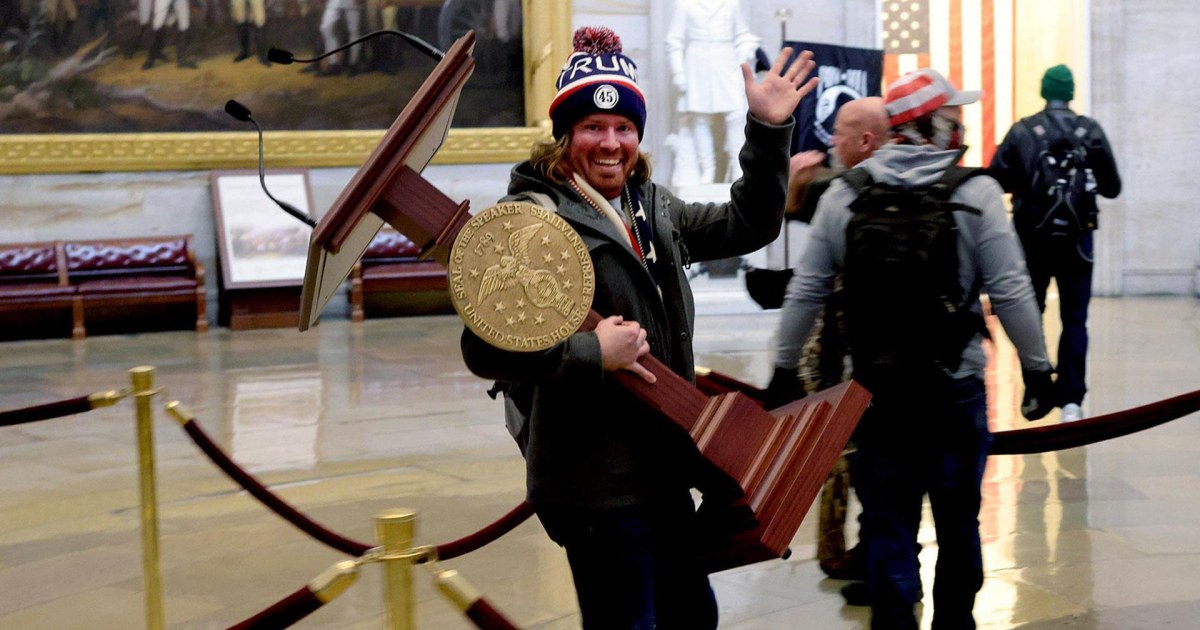 Watch: Man pictured carrying Pelosi’s lectern booked at police station