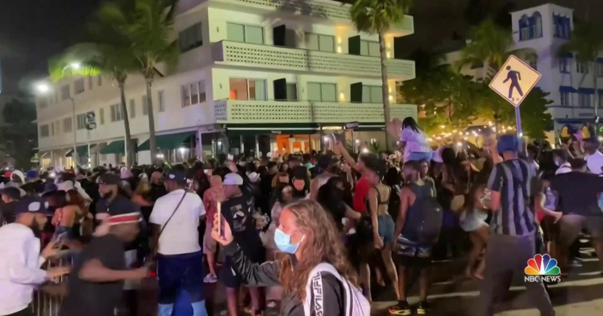 Spring breakers rebel and crowd streets amid new Miami Beach restrictions