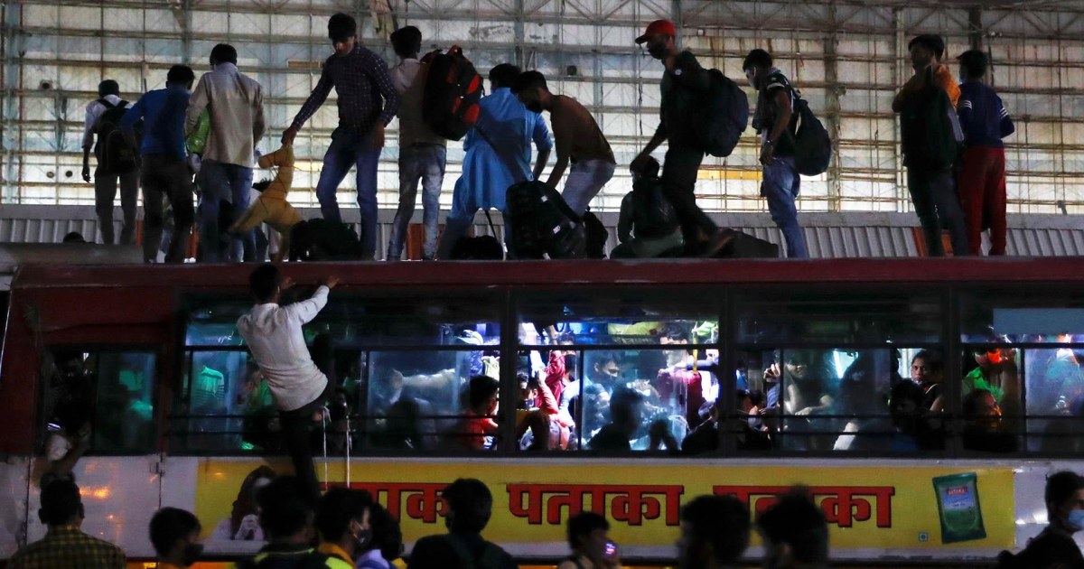 Migrant workers scramble to leave New Delhi before Covid lockdown