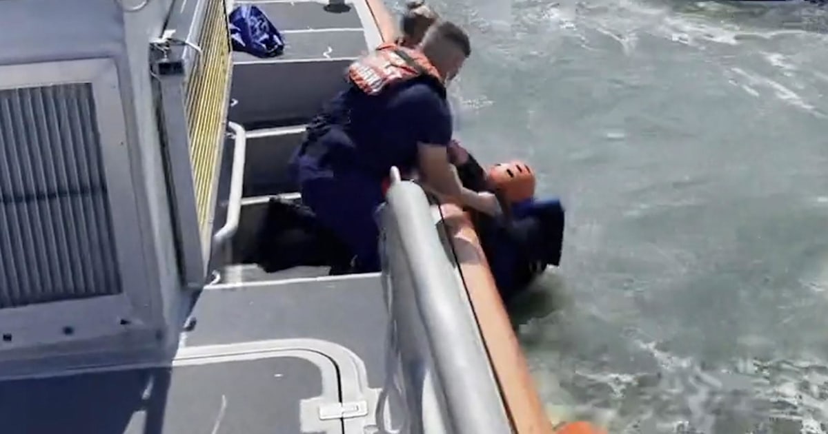 Coast Guard video shows rescue of a man after catamaran capsizes near ...
