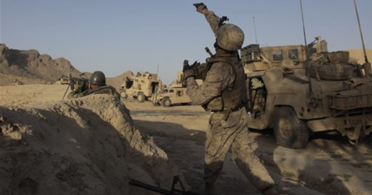 Marines, Taliban battle over key Afghan town