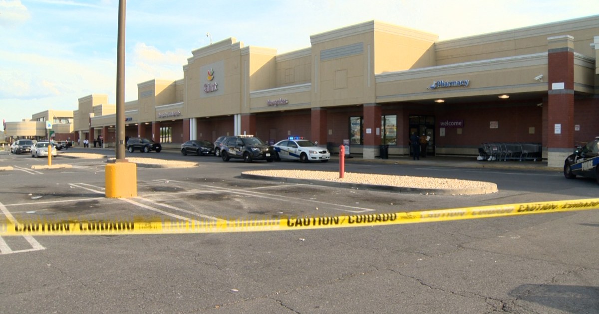 Baltimore grocery store guard shoots two people, kills one