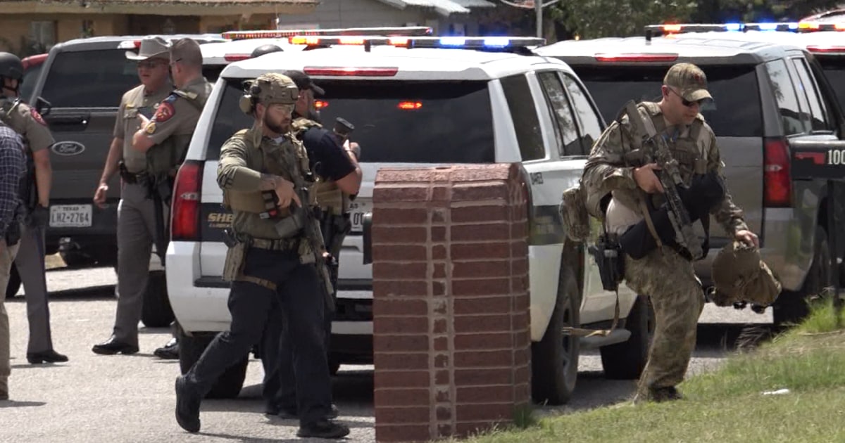 Officer killed, four others wounded in standoff with barricaded suspect ...