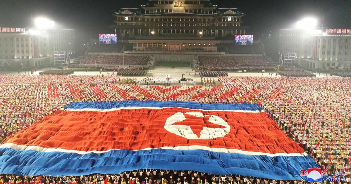 Kim Jong Un oversees North Korea celebrations with huge parade