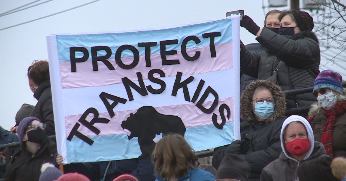 Hundreds rally in Minnesota to show support for publicly outed transgender child