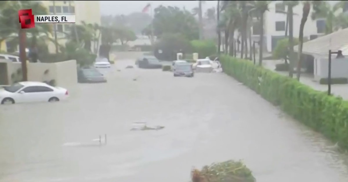 Cars and debris cover Naples streets after facing Hurricane Ian