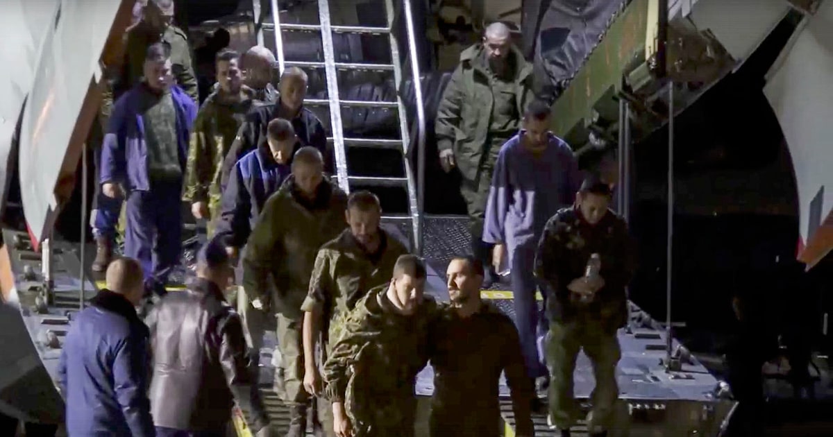 Russian prisoners return from Ukraine as civilians leave after