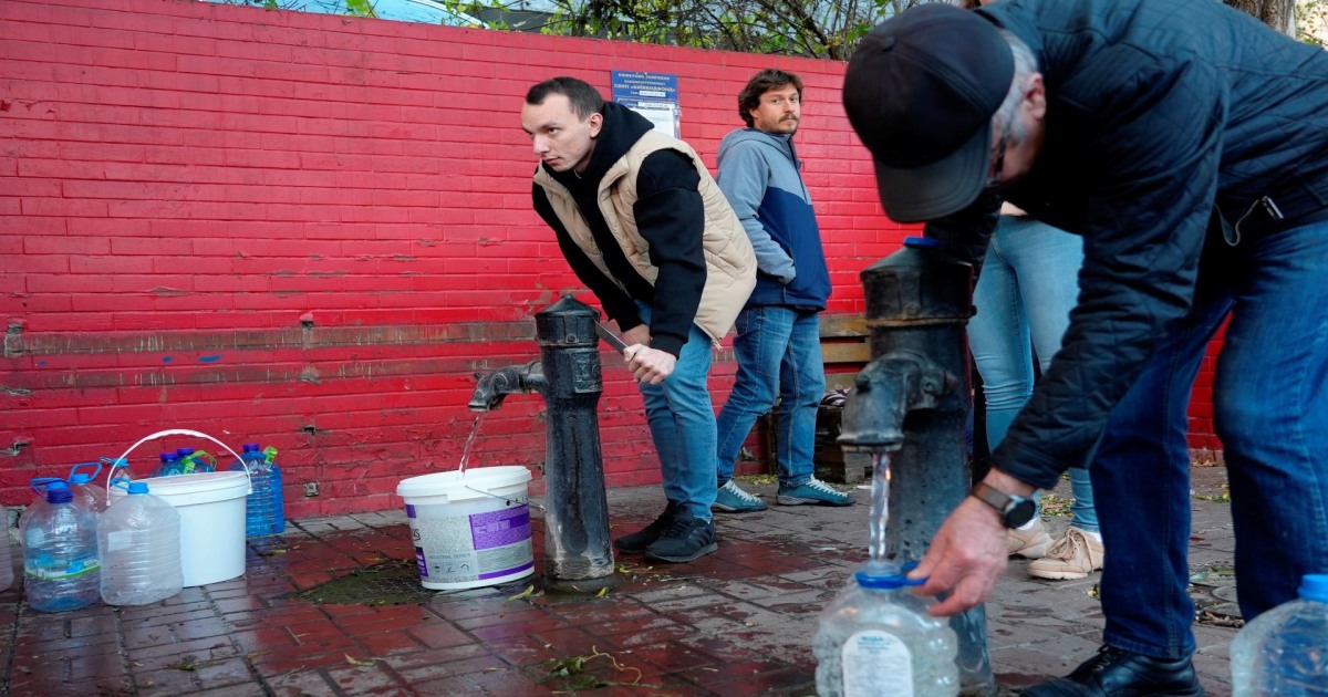 Kyiv residents fill up water bottles after Russian strikes damage infrastructure