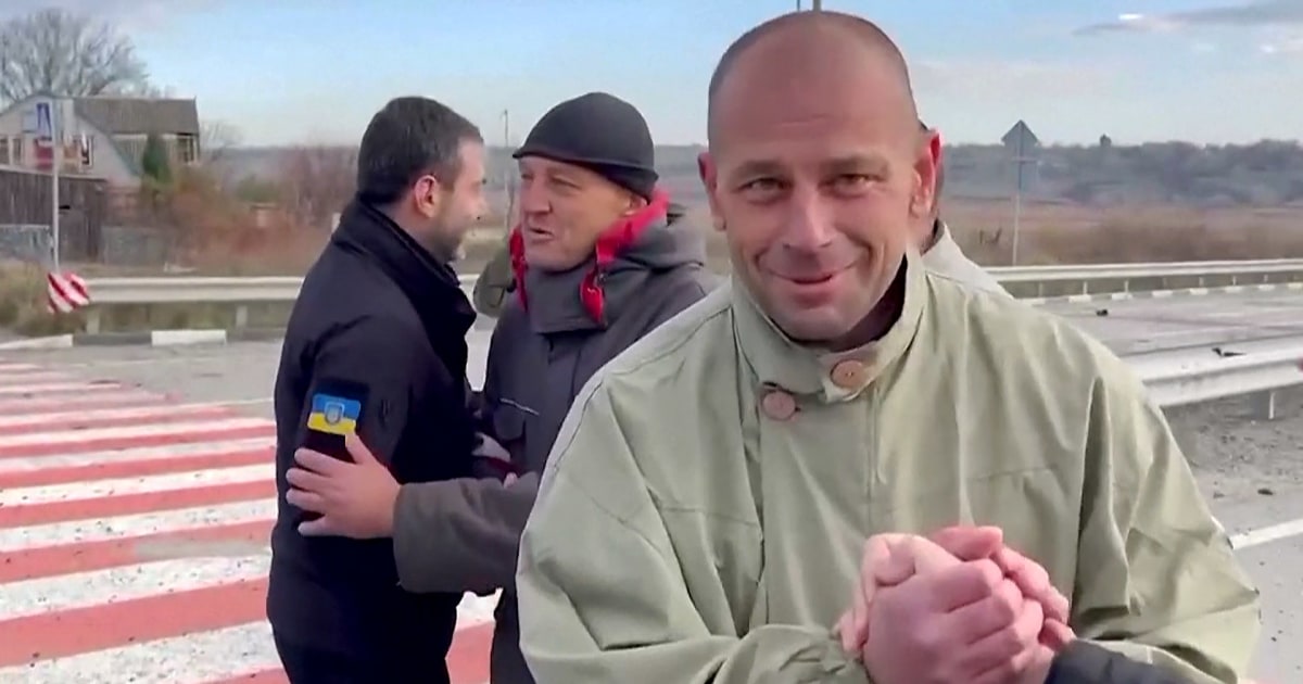 ‘Thank you for not abandoning us’: Ukrainian POWs freed in prisoner exchange with Russia