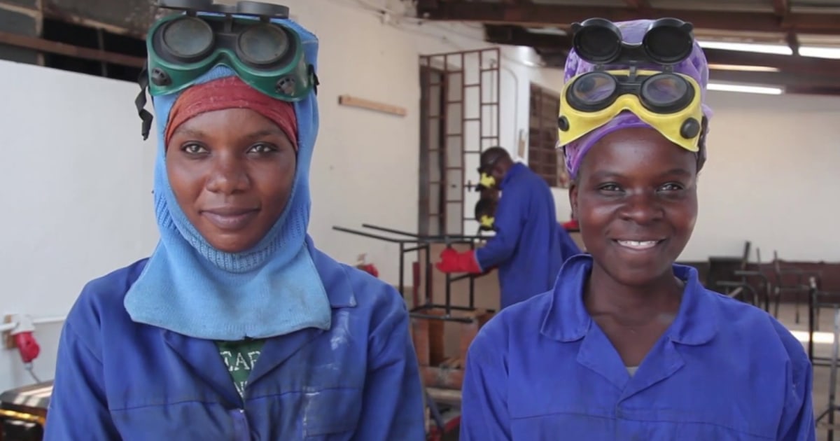 K.I.N.D. workers are ‘proud’ to make desks for kids