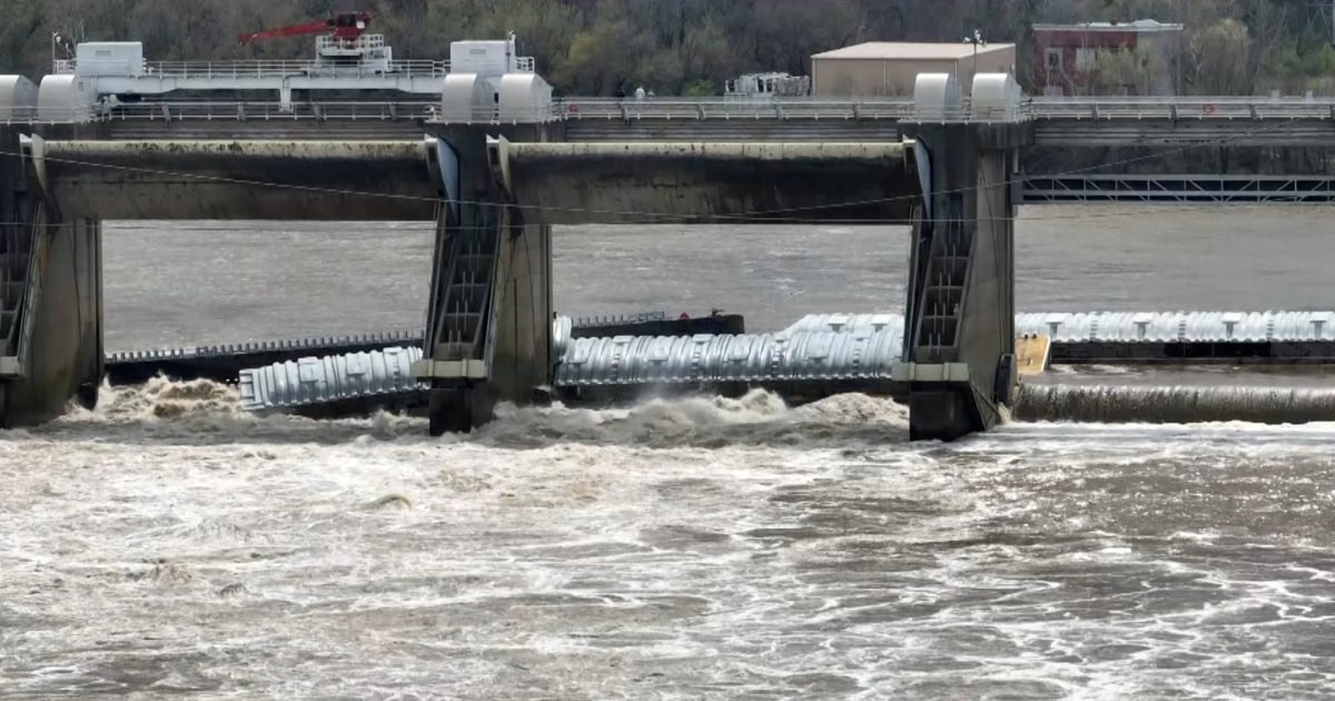 Three barges, one carrying toxic methanol, pinned against Ohio River