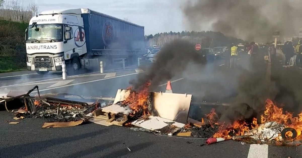 Protesters block French highway, garbage depot over pension reforms