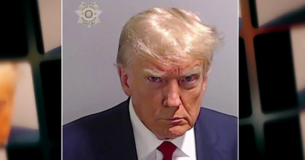 Trump and 18 co-defendants surrender in Georgia election case