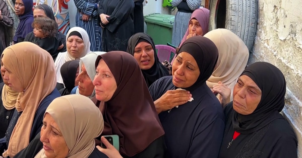 Palestinians hold funeral for two killed during Israeli military raid