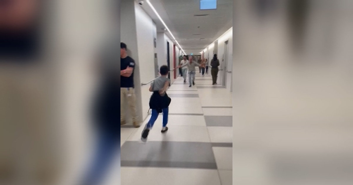 Watch: 9-year-old released by Hamas reunites with father