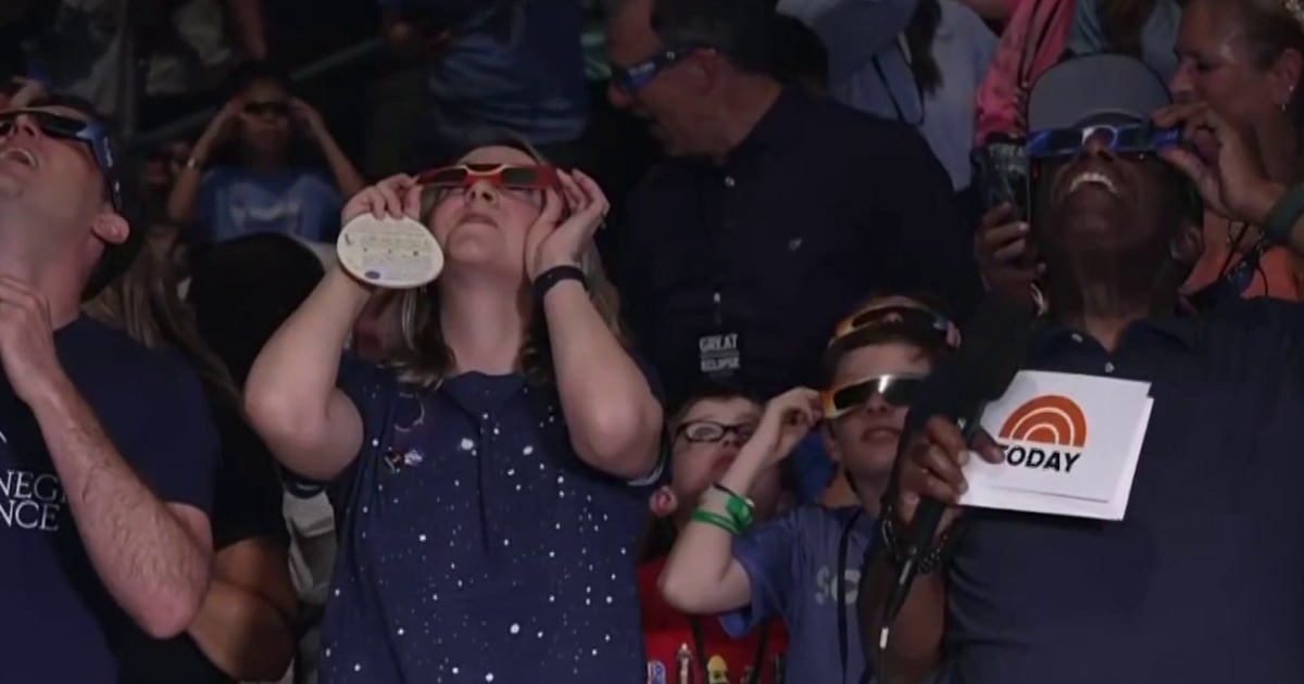 ‘Just amazing!’: Solar eclipse watchers go wild as the moment of totality passes over Dallas