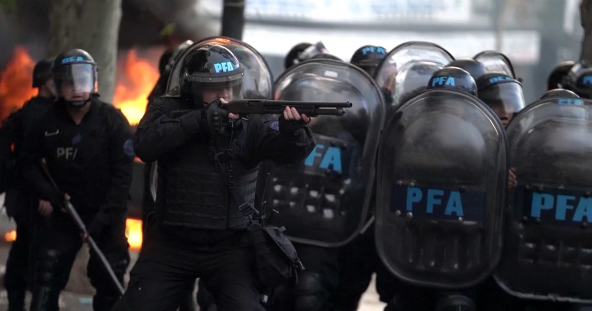Argentine riot police clash with protesters outside Congress