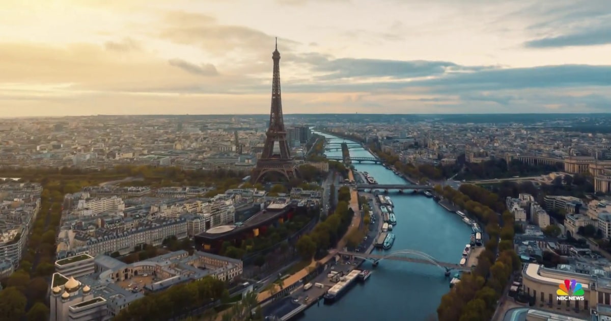 Paris mayor takes a swim in River Seine ahead of Olympics