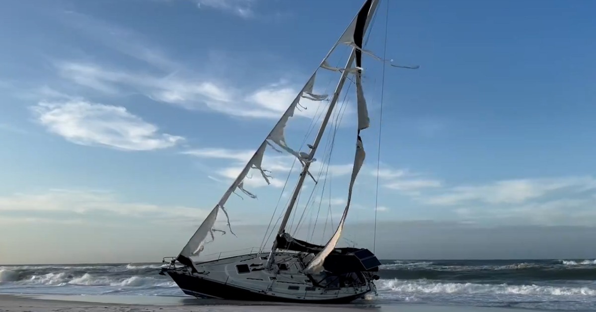 Ship washes up on Florida beach weeks after owner is rescued from it