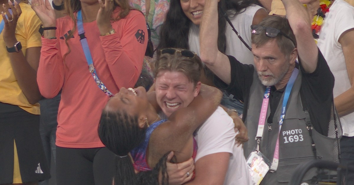 Tara DavisWoodhall's husband mic'd up watching her win gold at 2024 Games