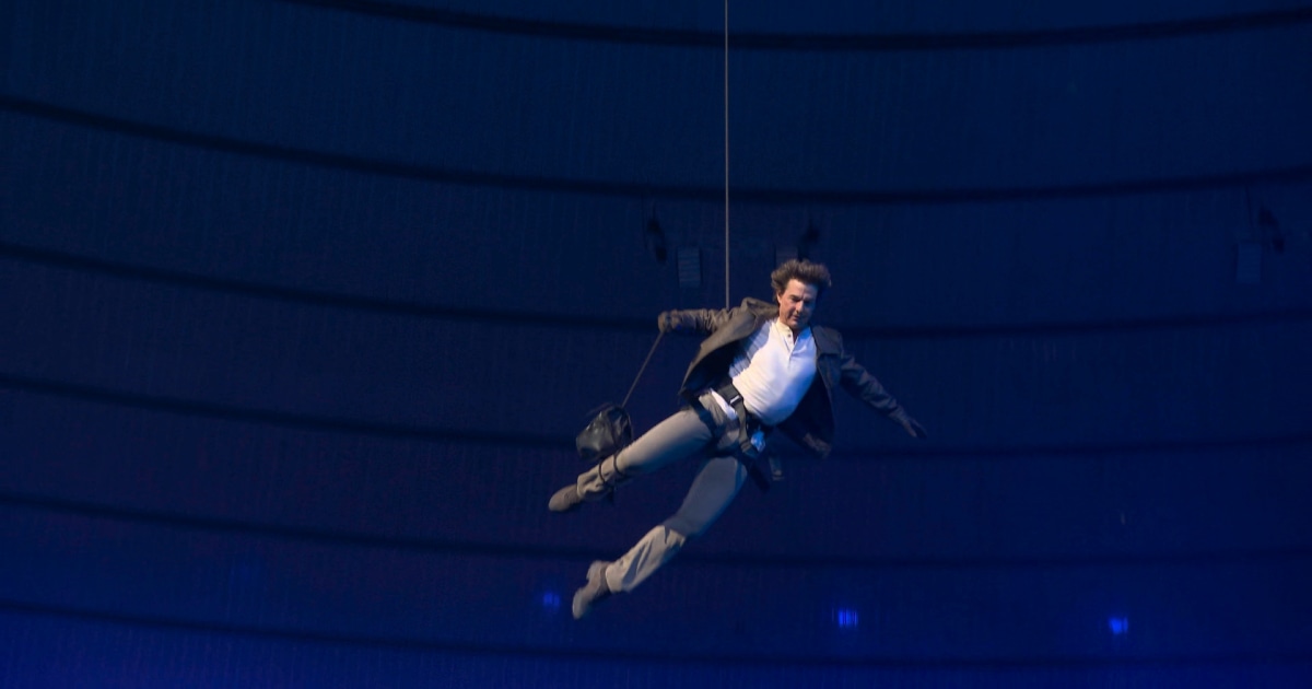 Tom Cruise repels from Stade de France roof