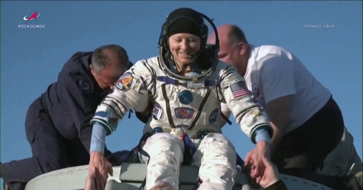 Russian cosmonauts and a U.S. astronaut return to Earth