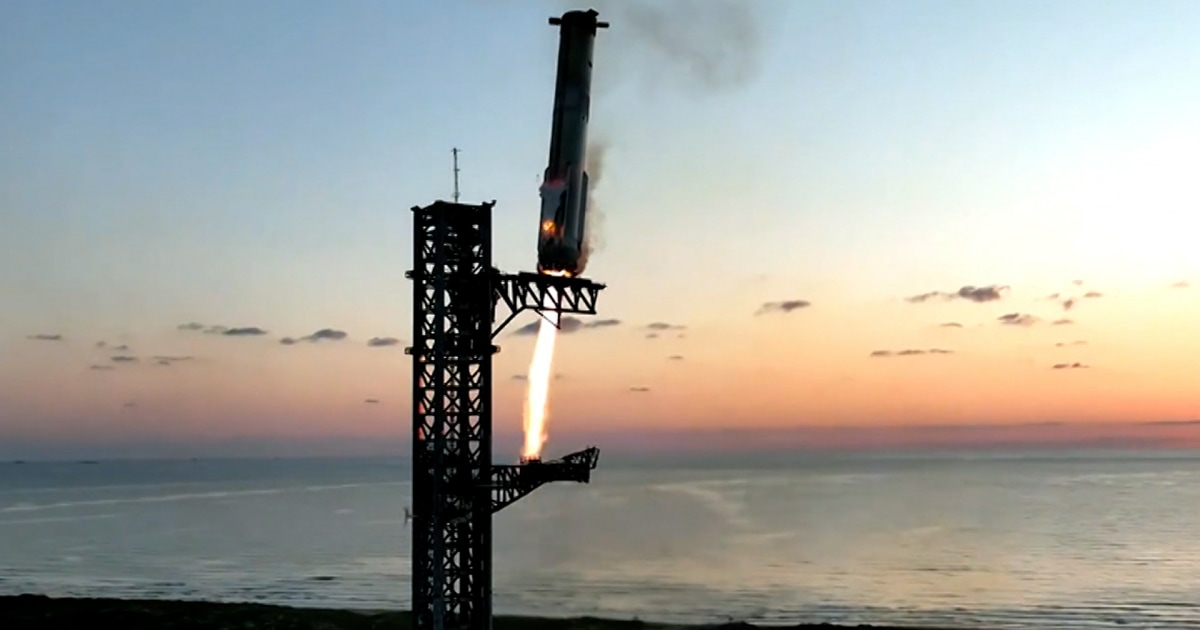 SpaceX’s Starship rocket booster successfully returns to launch tower’s arms