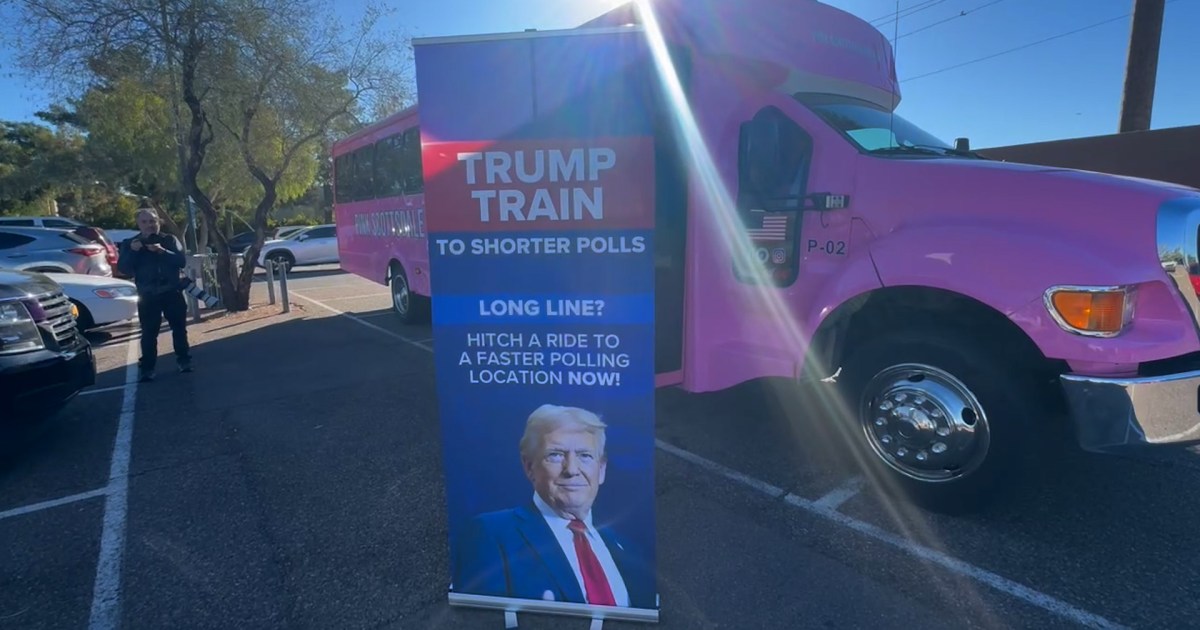 The pink “Trump Train” takes voters from both parties to a less crowded polling place in Maricopa County