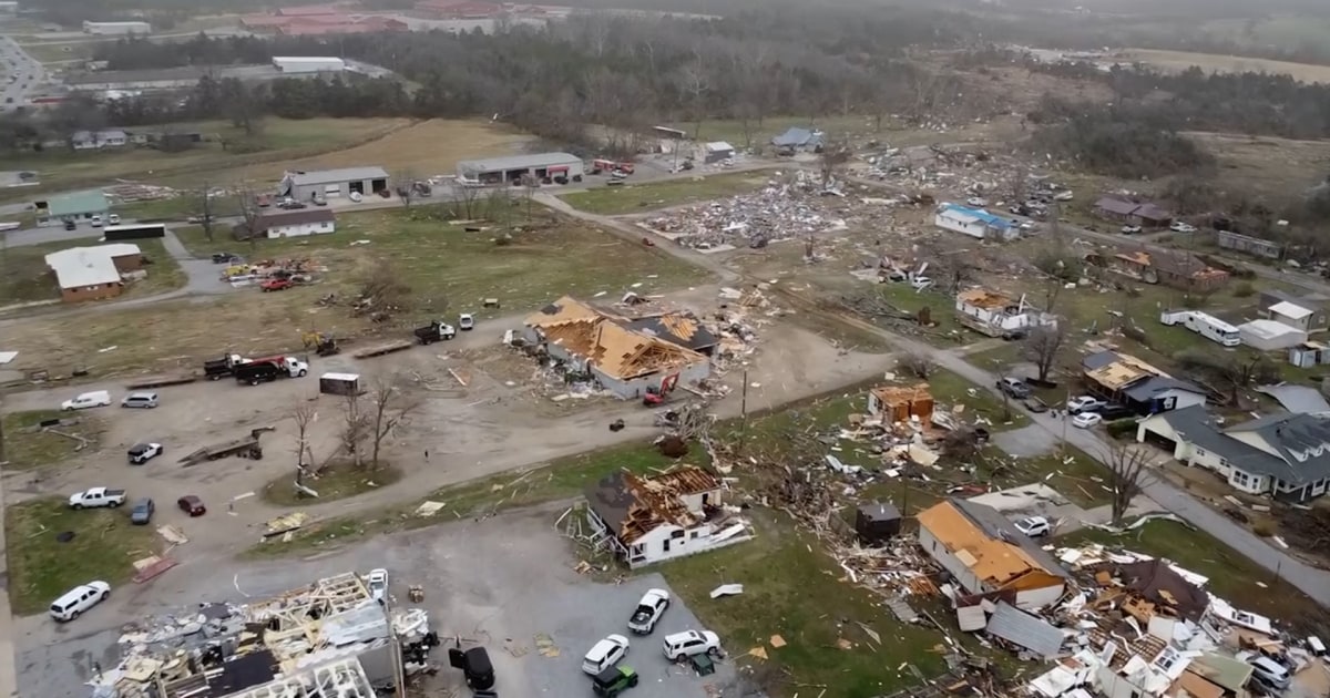 shows neighborhood in Arkansas left damaged after tornado