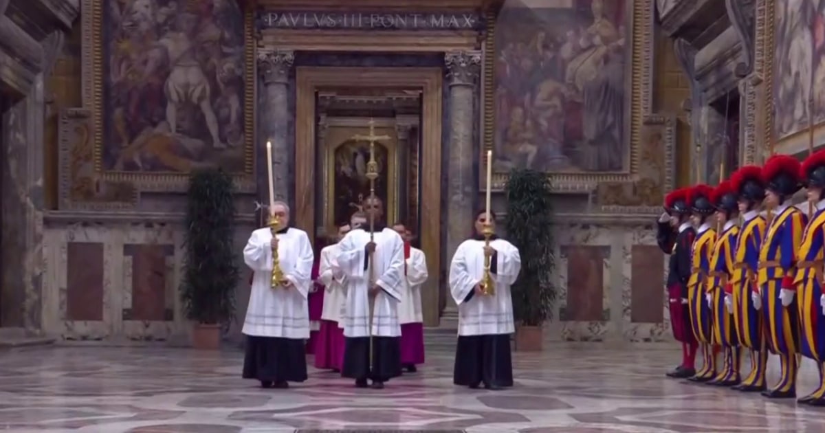 Cardinals process into the Sistine Chapel to begin the conclave