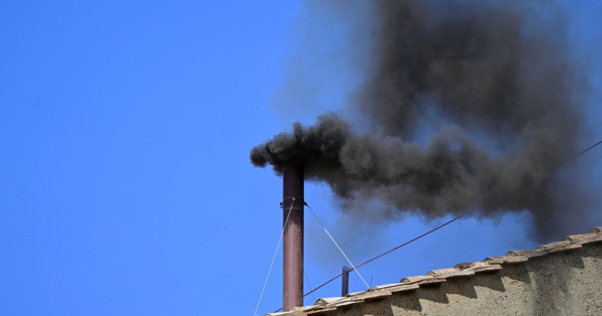 Black smoke billows for second time as cardinals remain undecided on new pope